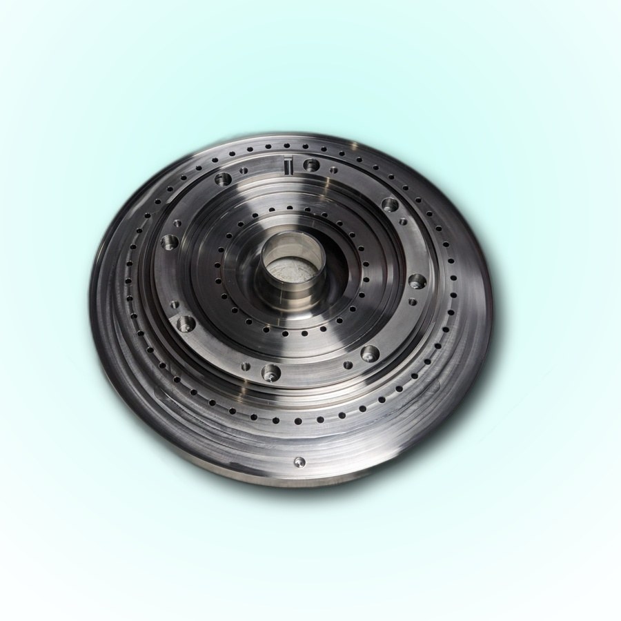 SS316L anode back plate for an MRI scanner, 350 mm outside diameter, machined to 0.2 mm
