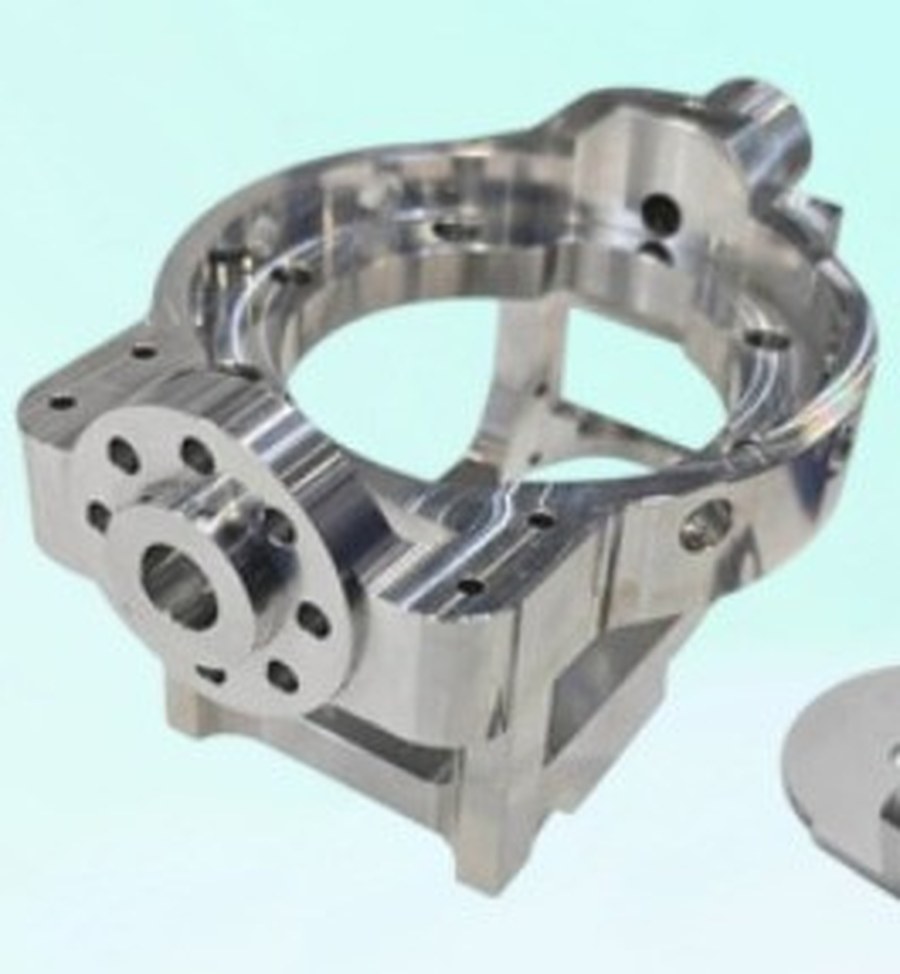 Titanium component machined on all six faces to a positional tolerance of 0.1 mm
